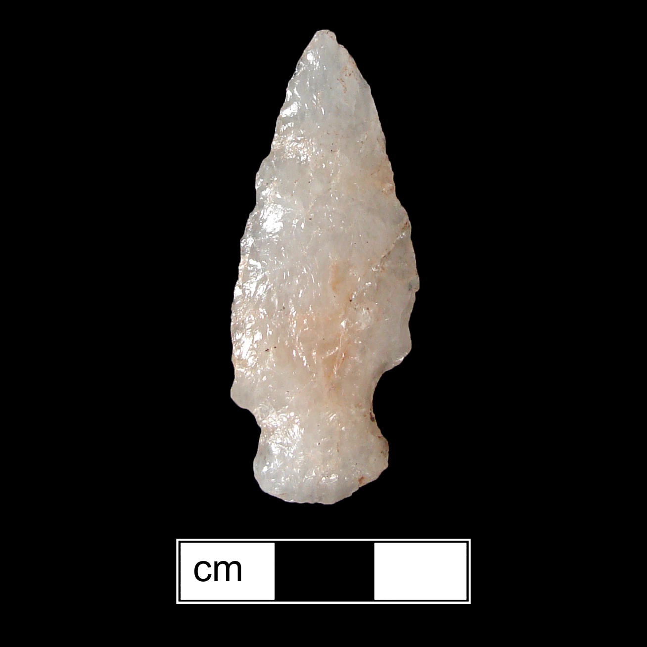 Image of stone projectile point made of Quartz, Side-Notched shape, with a Expanding stem, Excurvate blade, and Convex base shape. Lamoka type.