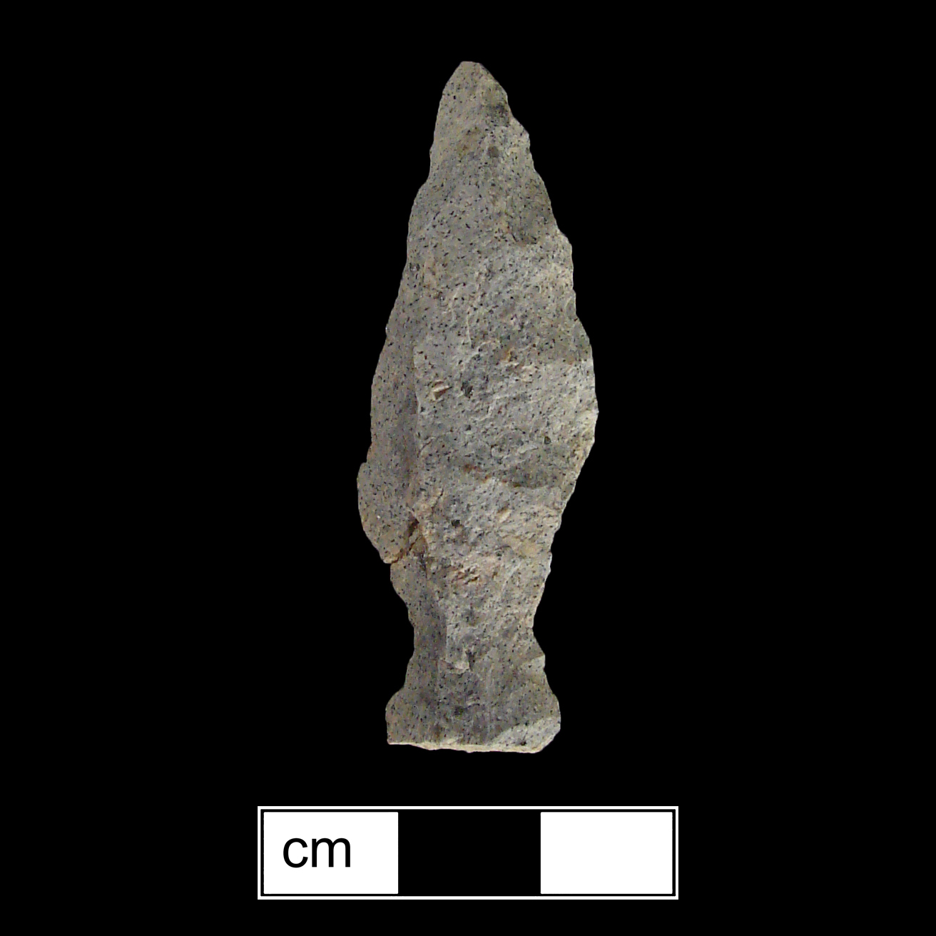 Image of stone projectile point made of Rhyolite, Side-Notched shape, with a Expanding stem, Excurvate blade, and Straight base shape. Lamoka type.