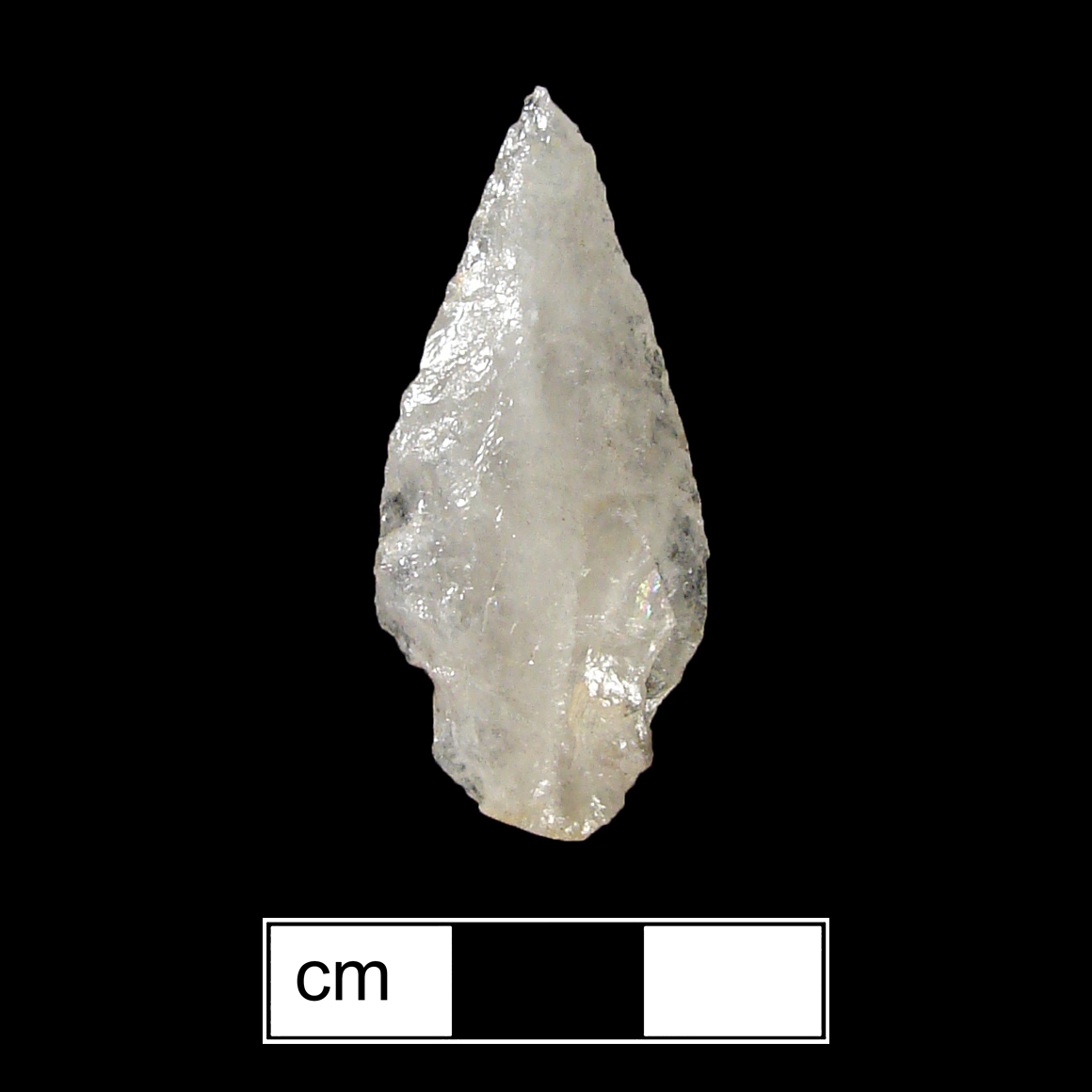 Image of stone projectile point made of Quartz, Stemmed shape, with a Contracting stem, Excurvate blade, and Convex base shape. Lamoka type.