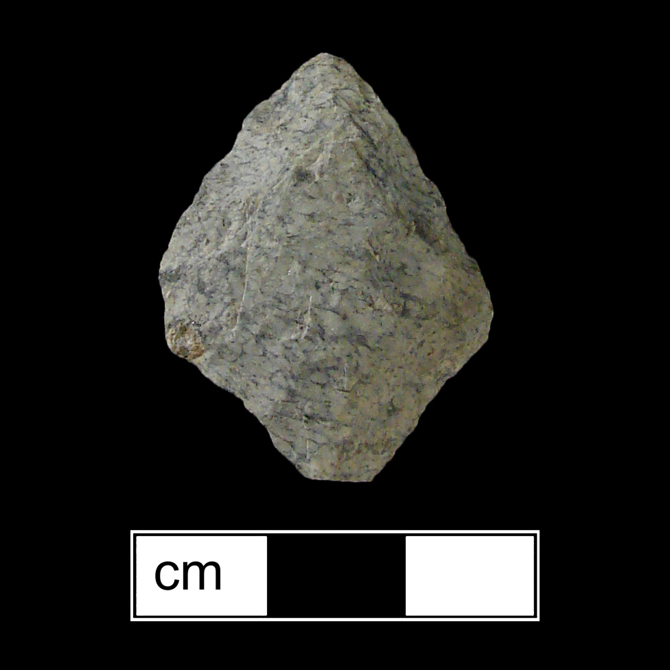 Image of stone projectile point made of Rhyolite, Contracting Stem shape, with a contracting stem, Straight blade, and Straight base shape. Lehigh/Koens-Crispin type.