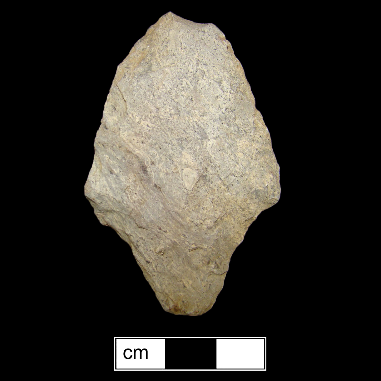 Image of stone projectile point made of Rhyolite, Contracting Stem shape, with a Contracting stem, Excurvate blade, and Straight base shape. Lehigh/Koens-Crispin type.