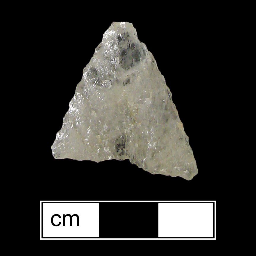 Image of stone projectile point made of Quartz, Triangular shape, with a N/A stem, Straight blade, and Concave base shape. Levanna type.