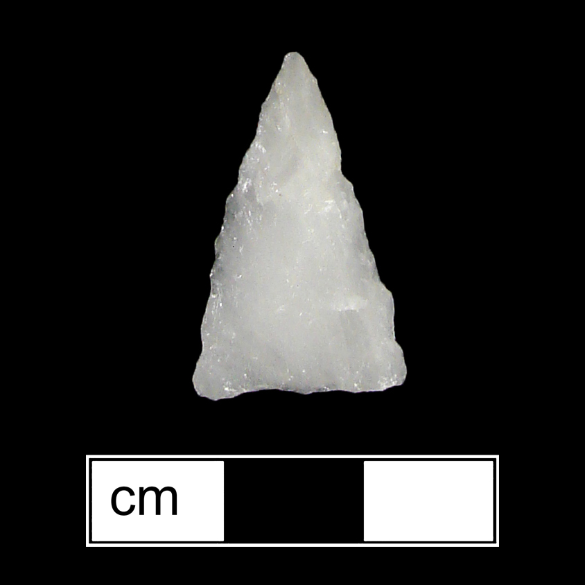 Image of stone projectile point made of Quartz, Triangular shape, with a N/A stem, Straight blade, and Straight base shape. Madison type.