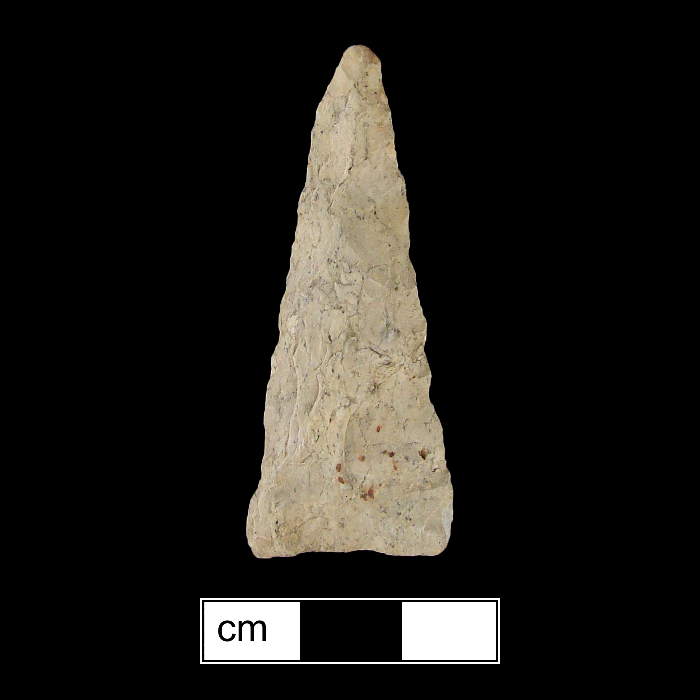 Image of stone projectile point made of Rhyolite, Triangular shape, with a N/A stem, Straight blade, and Concave base shape. Madison type.