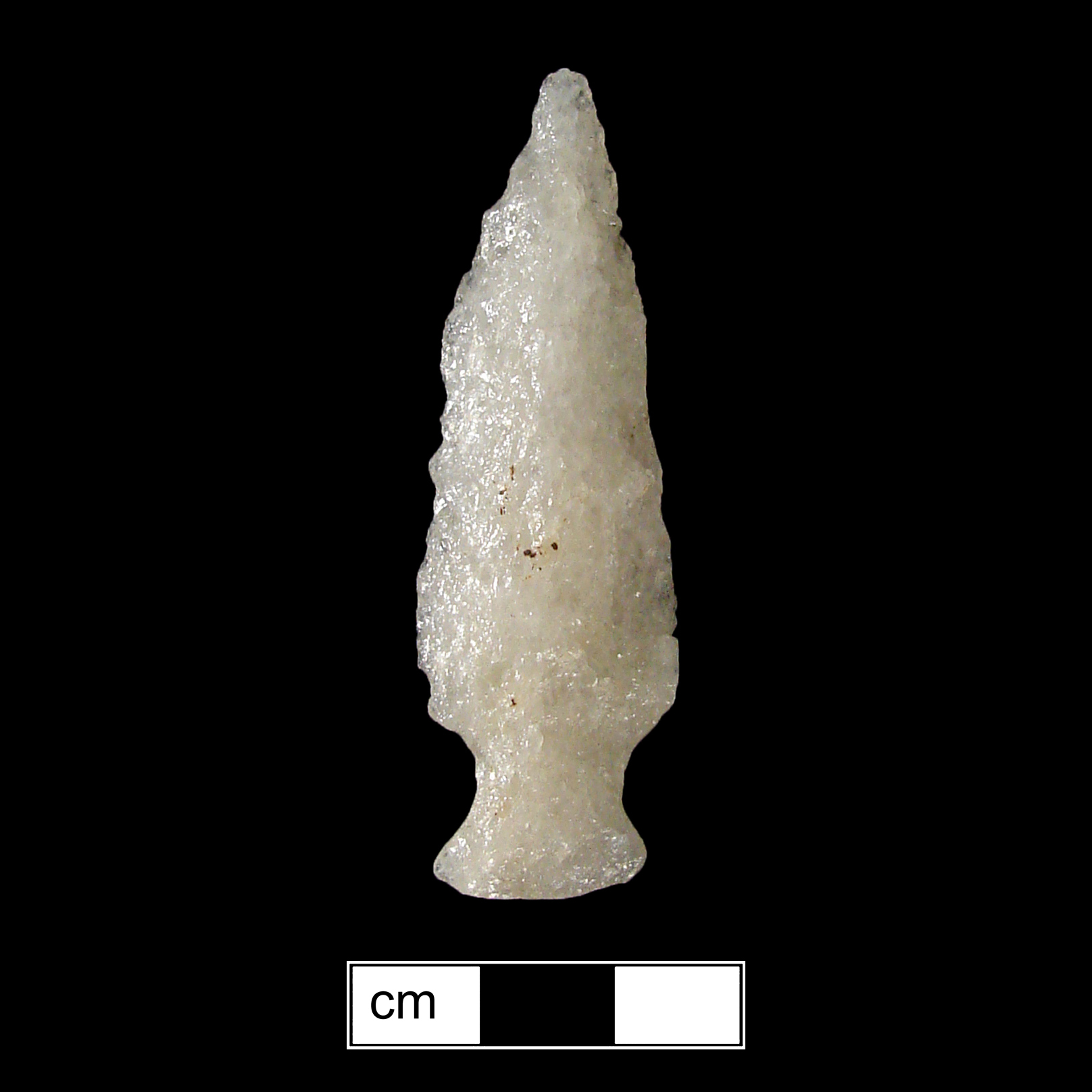 Image of stone projectile point made of Quartz, Side-Notched shape, with a Expanding stem, Excurvate blade, and Convex base shape. Normanskill type.
