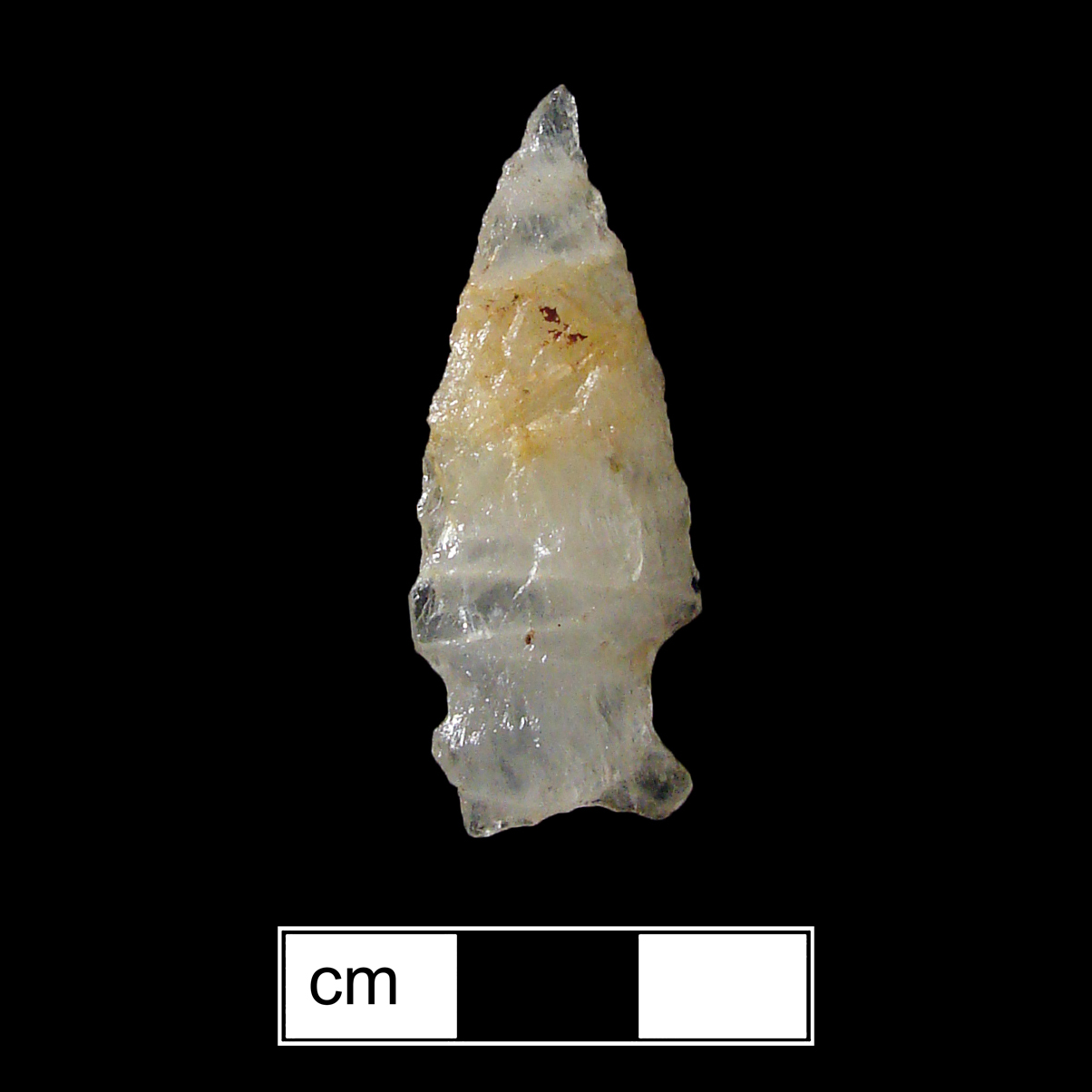 Image of stone projectile point made of Quartz, Side-Notched shape, with a Expanding stem, Excurvate blade, and Concave base shape. Normanskill type.