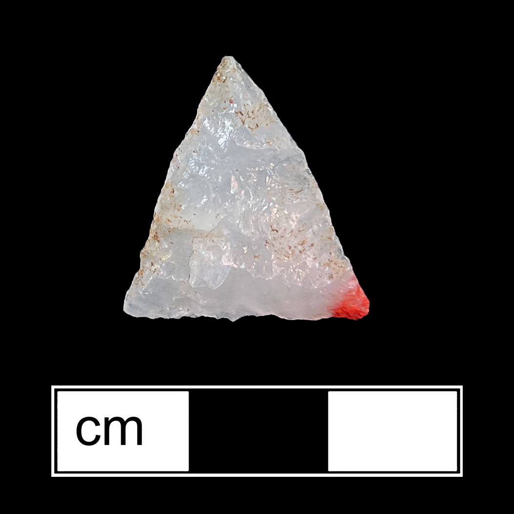 Image of stone projectile point made of Quartz, Triangular shape, with a N/A stem, Straight blade, and Straight base shape. Potomac type.