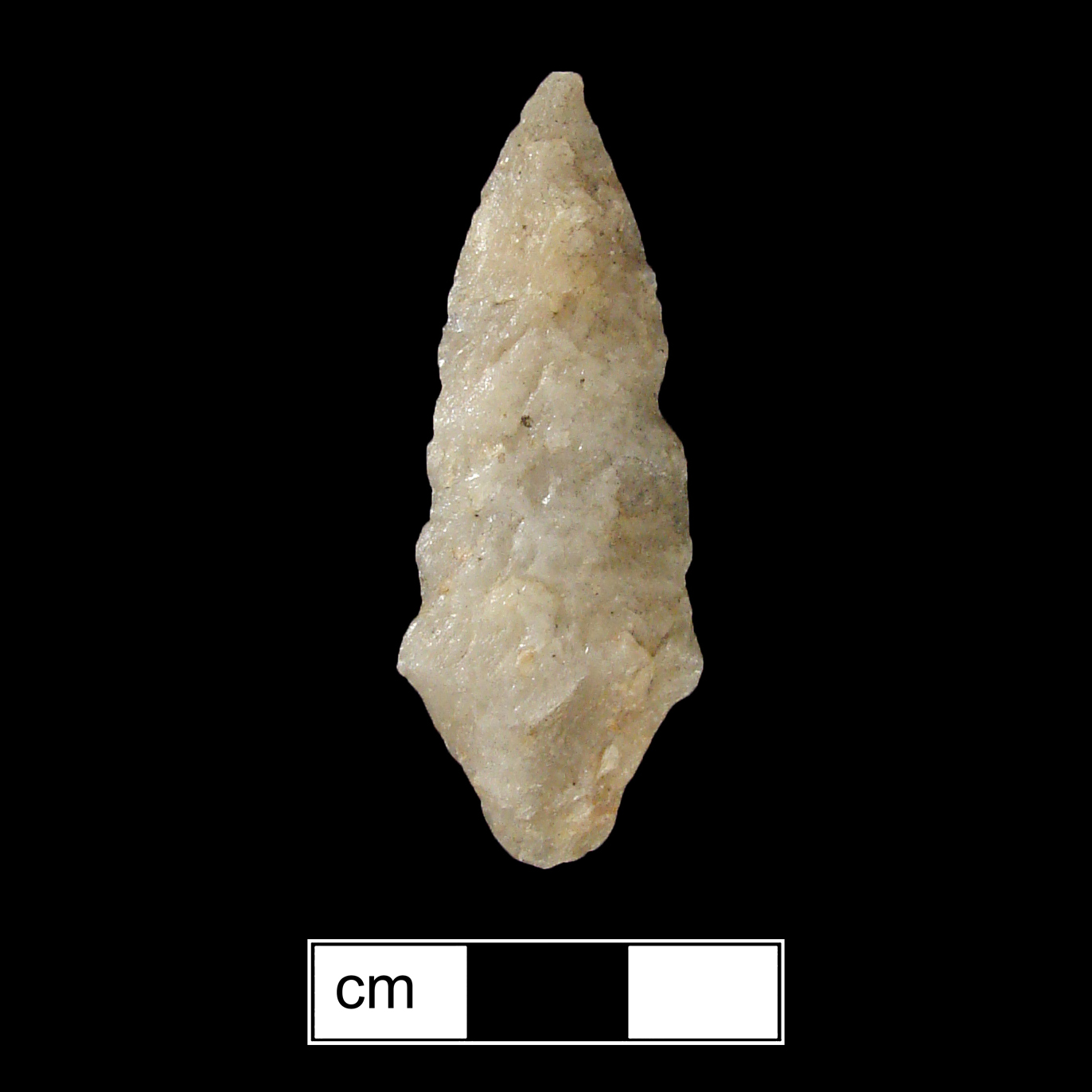 Image of stone projectile point made of Quartz, Contracting Stem shape, with a Contracting stem, Excurvate blade, and Convex base shape. Rossville type.