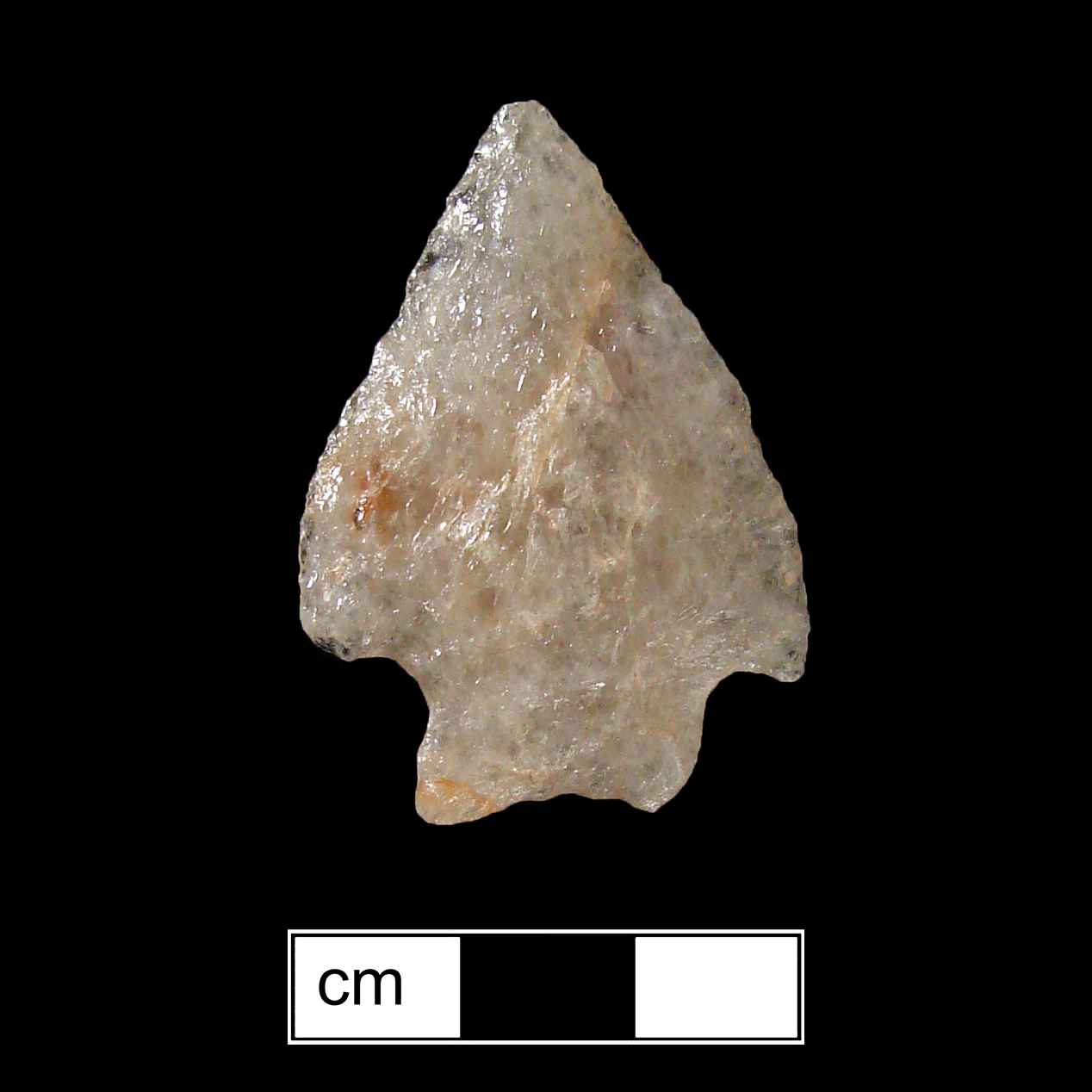 Image of stone projectile point made of Quartz, Bifurcate shape, with a Straight stem, Excurvate blade, and Concave base shape. Stanly type.