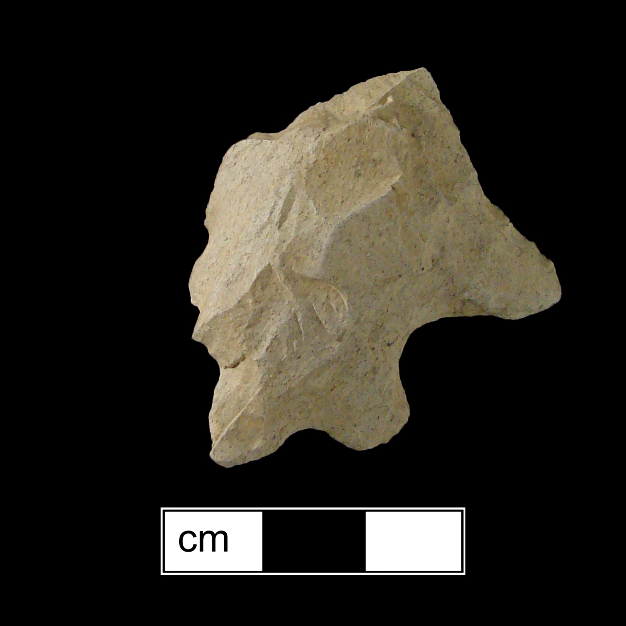 Image of stone projectile point made of Rhyolite, Bifurcate shape, with a Straight stem, N/A blade, and Bifurcate base shape. Stanly type.