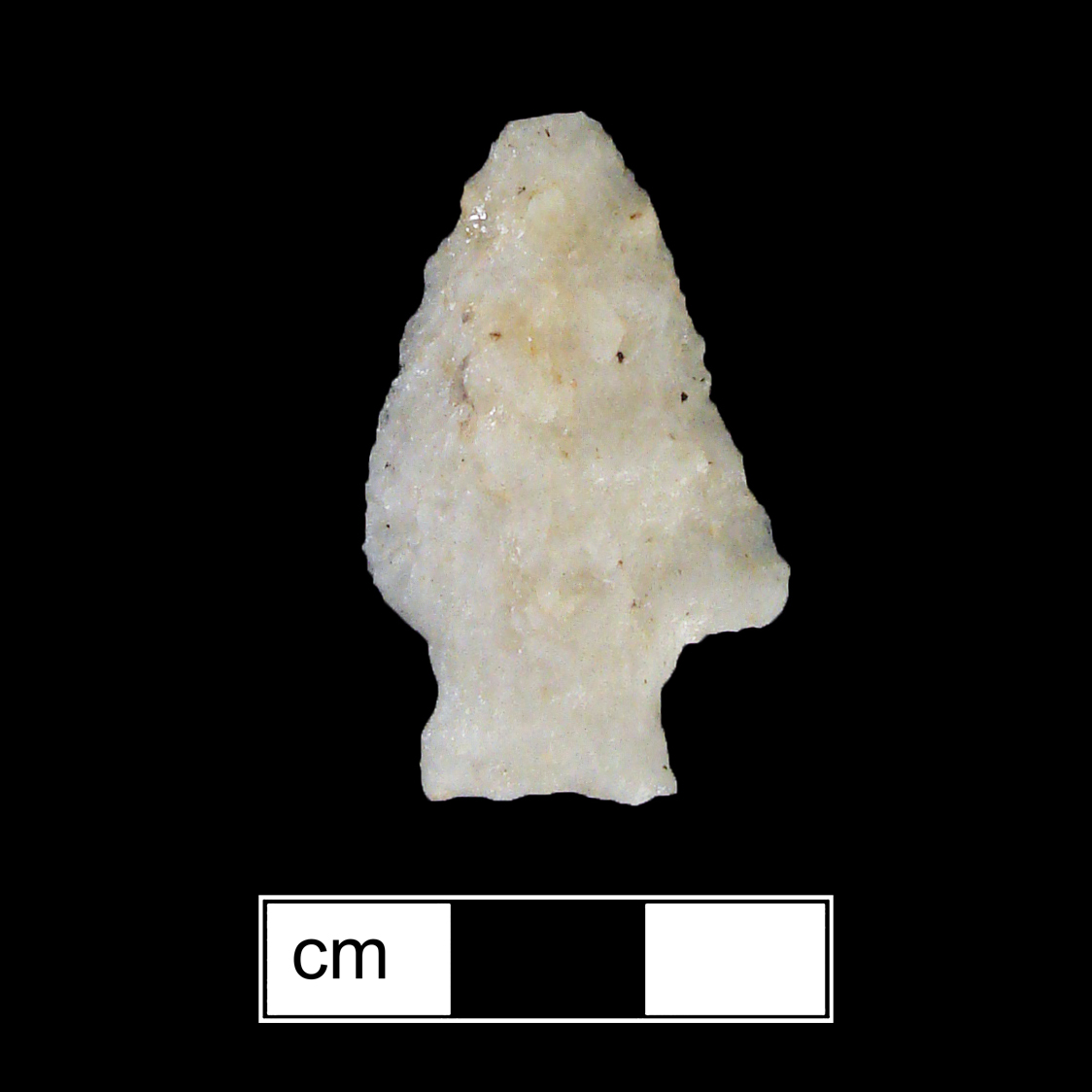 Image of stone projectile point made of Quartz, Stemmed shape, with a Expanding stem, Straight blade, and Straight base shape. Vernon type.