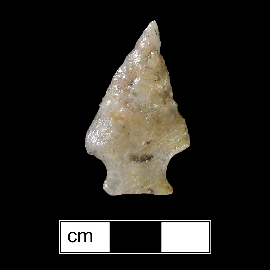 Image of stone projectile point made of Quartz, Stemmed shape, with a Expanding stem, Straight blade, and Straight base shape. Vernon type.