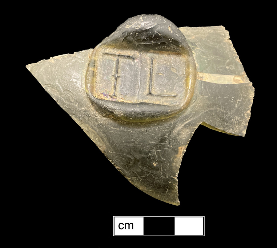 Image of colored glass bottle seal, Names or Initials.