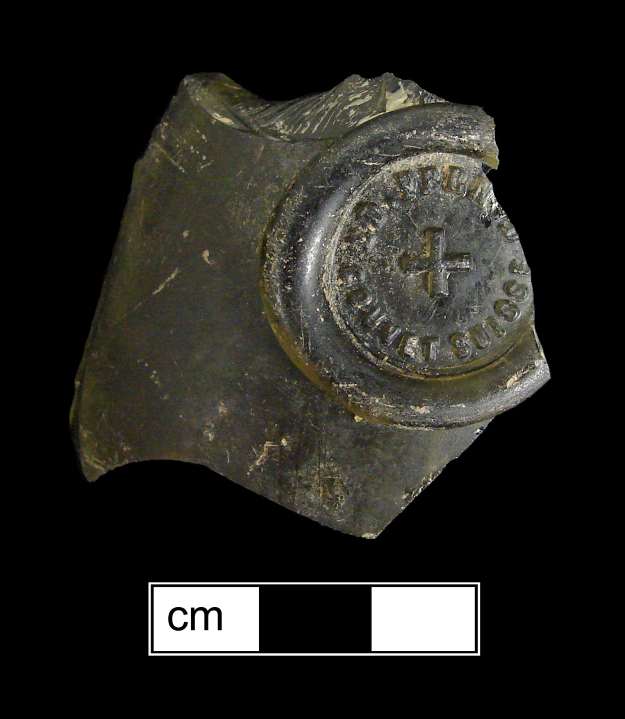 Image of colored glass bottle seal, Commercial Mark.