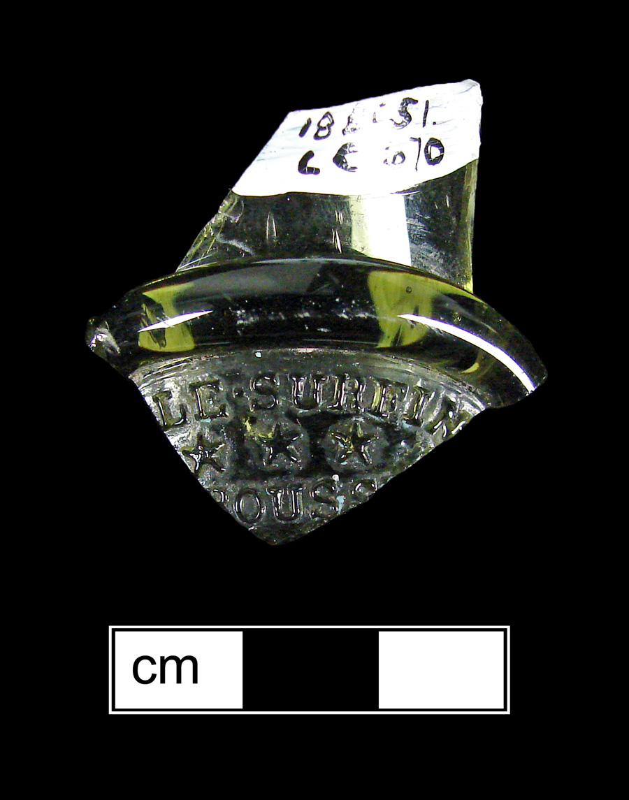 Image of colored glass bottle seal, Commercial Mark.