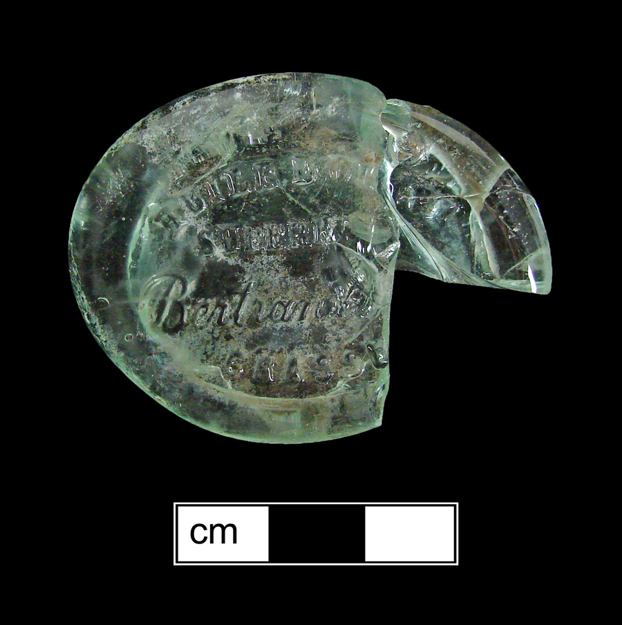 Image of colored glass bottle seal, Commercial Mark.