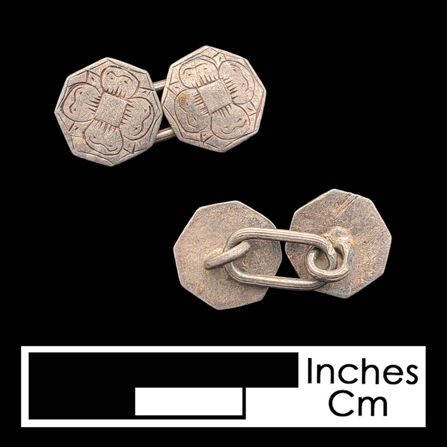 Image of silver linked button.