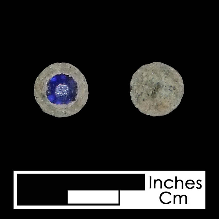 Image of copper alloy/glass linked button.