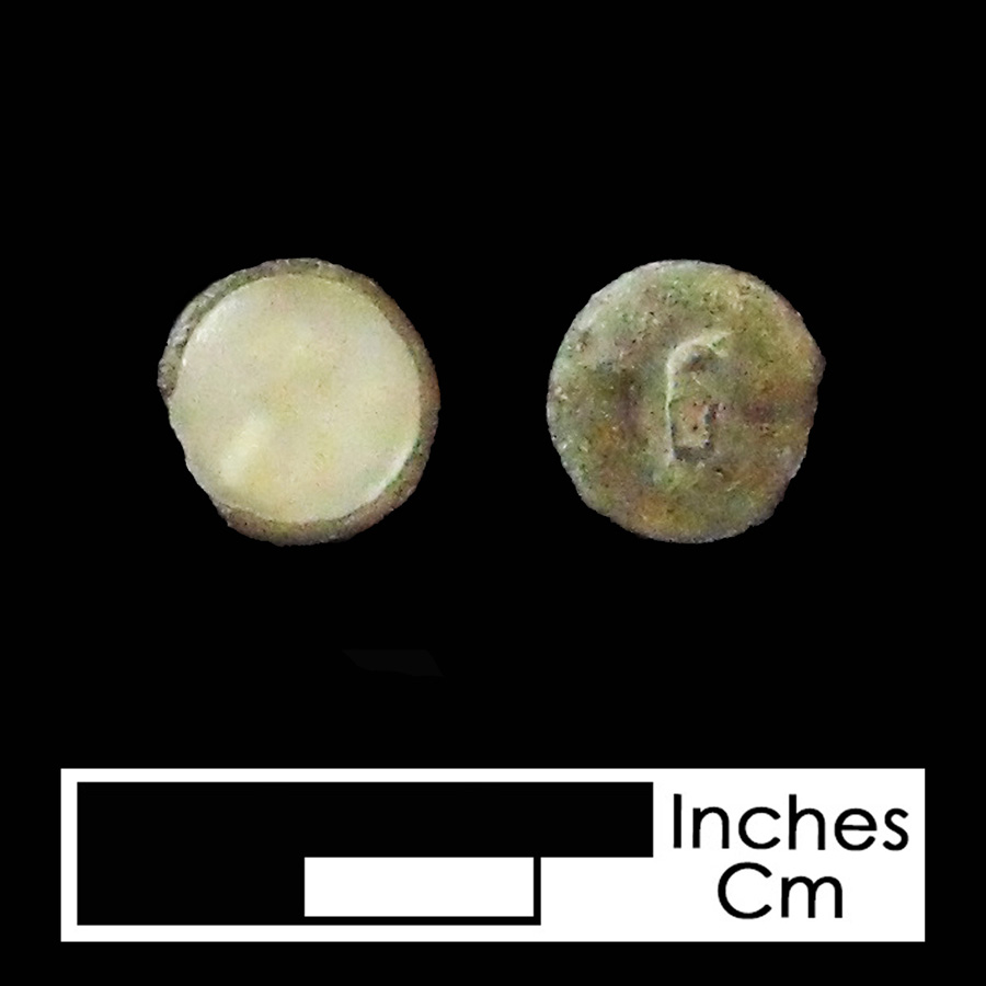 Image of copper alloy/glass linked button.