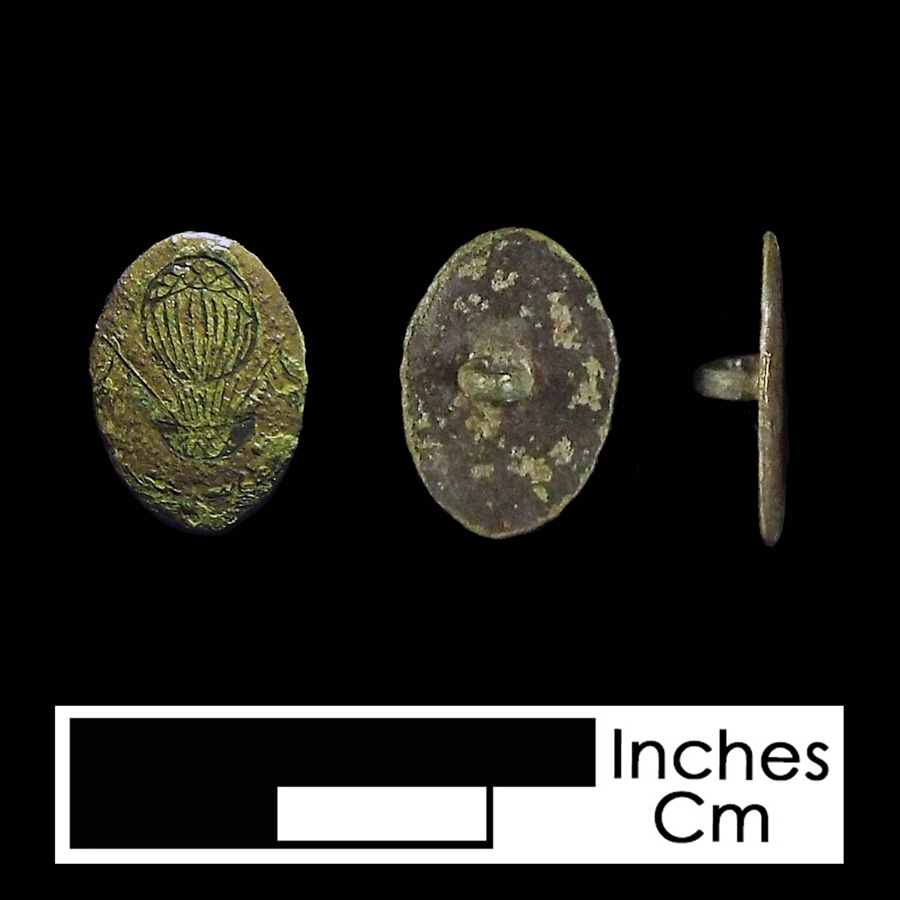 Image of copper alloy linked button.
