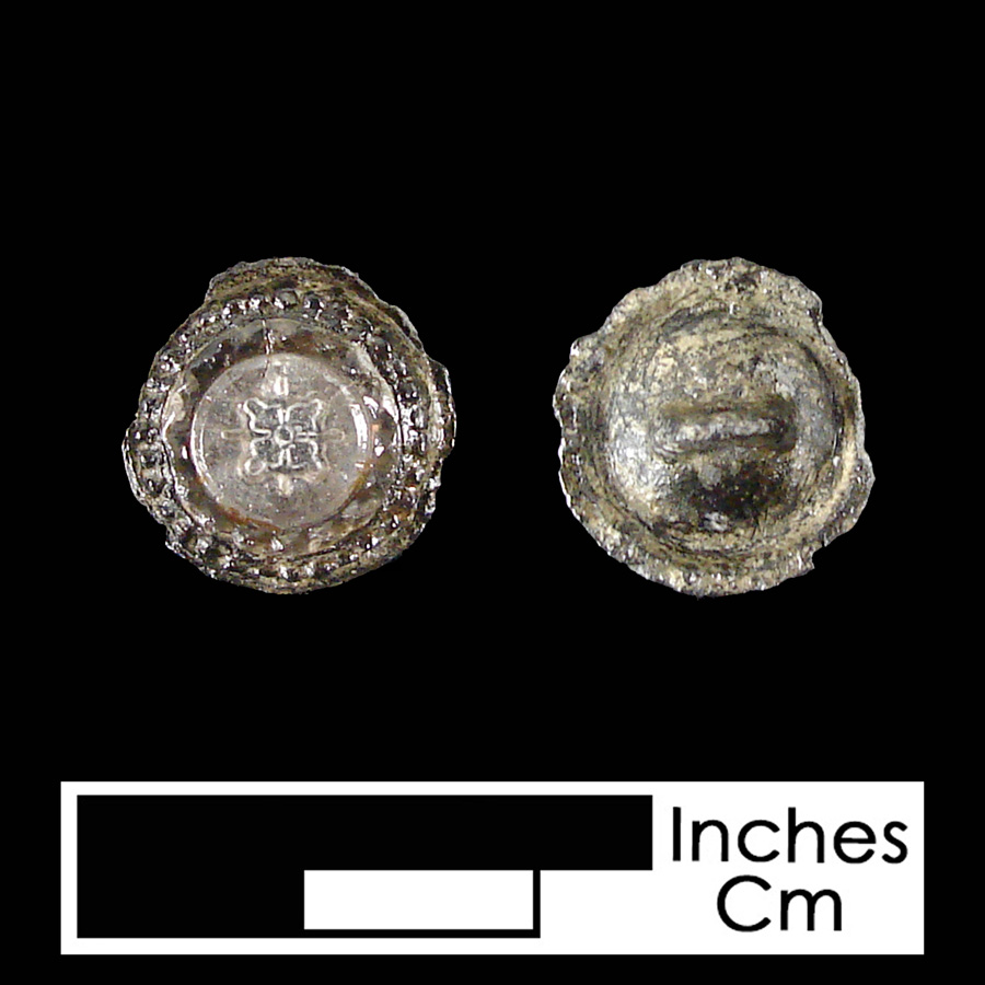 Image of pewter or silver/glass linked button.