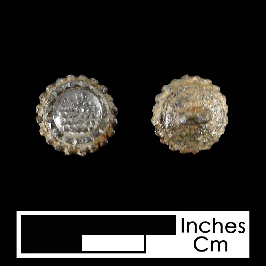 Image of pewter or silver/glass linked button.