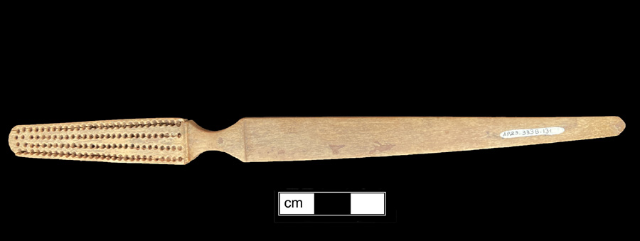 Image of bone toothbrush handle, trepanned, Louisiana type.
