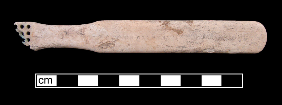 Image of bone toothbrush handle, wire drawn, England type, Maryland variety.