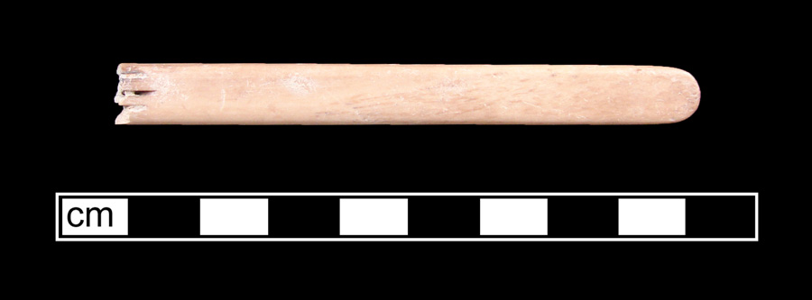 Image of bone toothbrush handle, wire drawn.