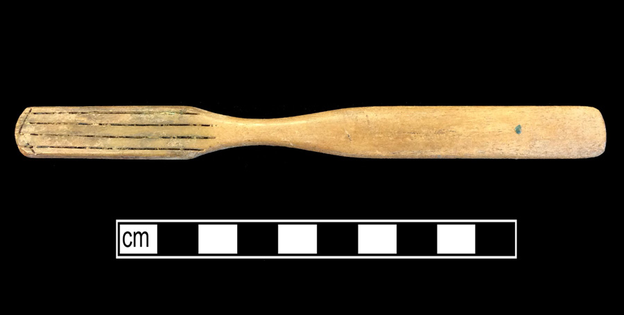 Image of bone toothbrush handle, wire drawn, England type.
