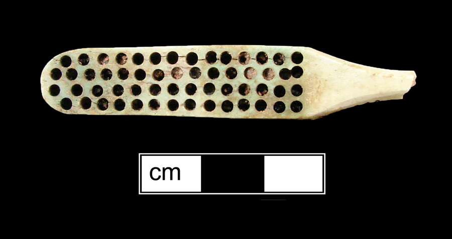 Image of bone toothbrush handle, wire drawn.