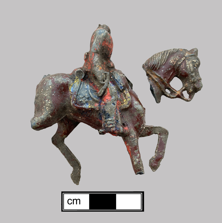 Image of white metal painted toy animal.