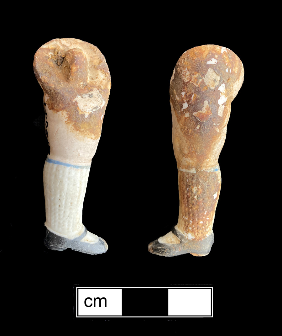 Image of porcelain bisque painted toy doll.
