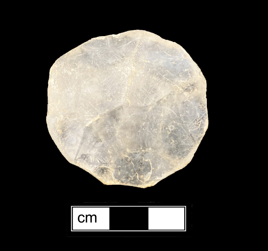 Image of coarse red-bodied earthenware game piece.