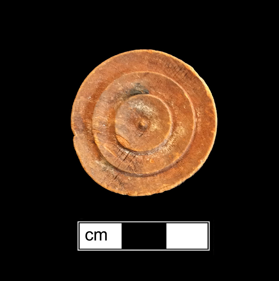 Image of wood game piece.