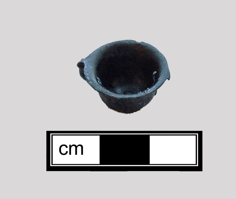 Image of base metal toy cup.