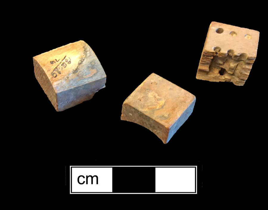 Image of bone game piece.