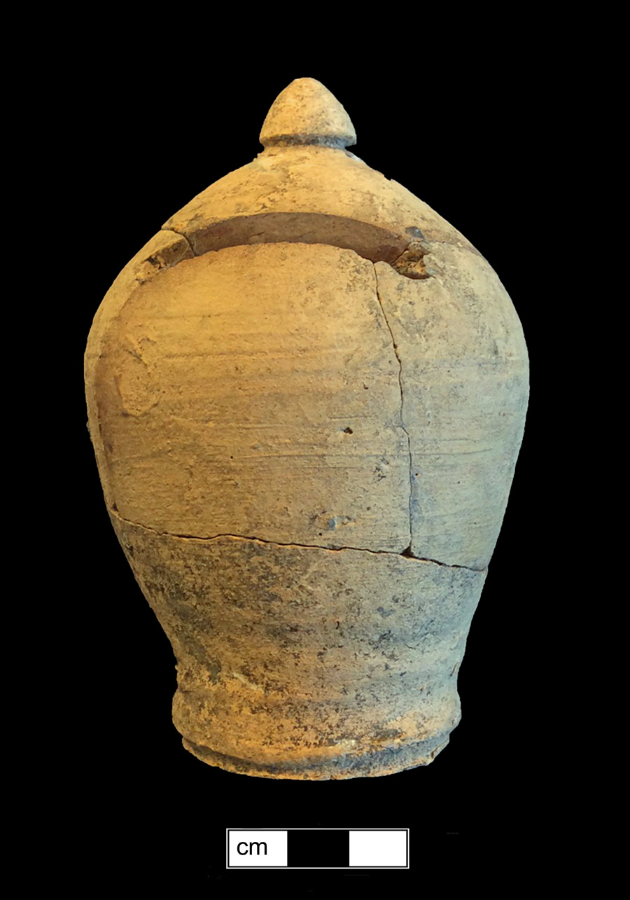 Image of coarse red-bodied earthenware toy bank.
