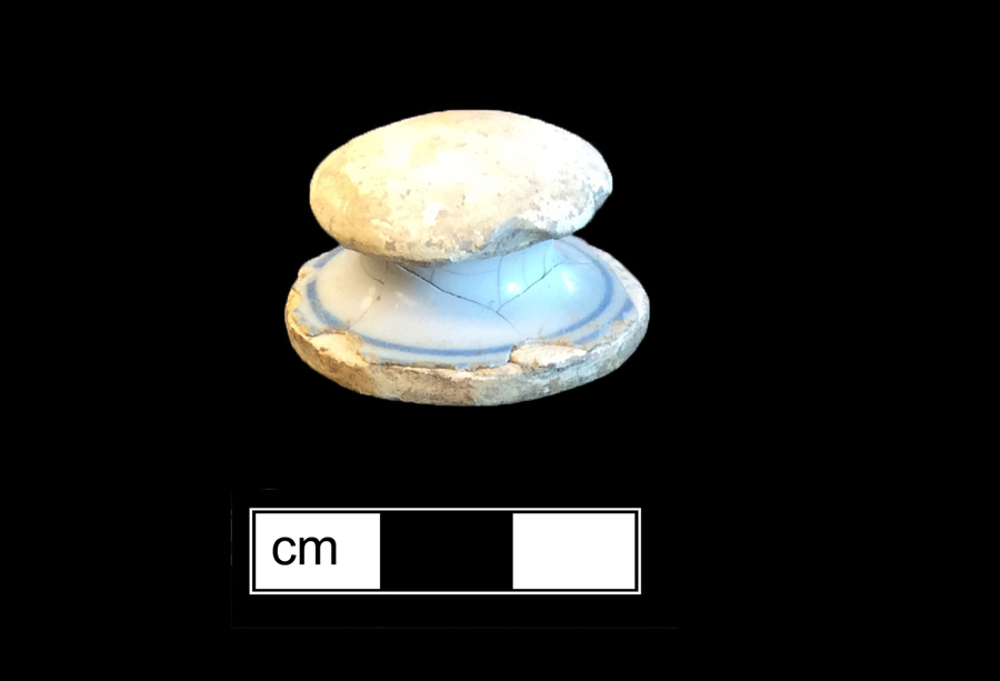 Image of tin-glazed earthenware painted game piece.
