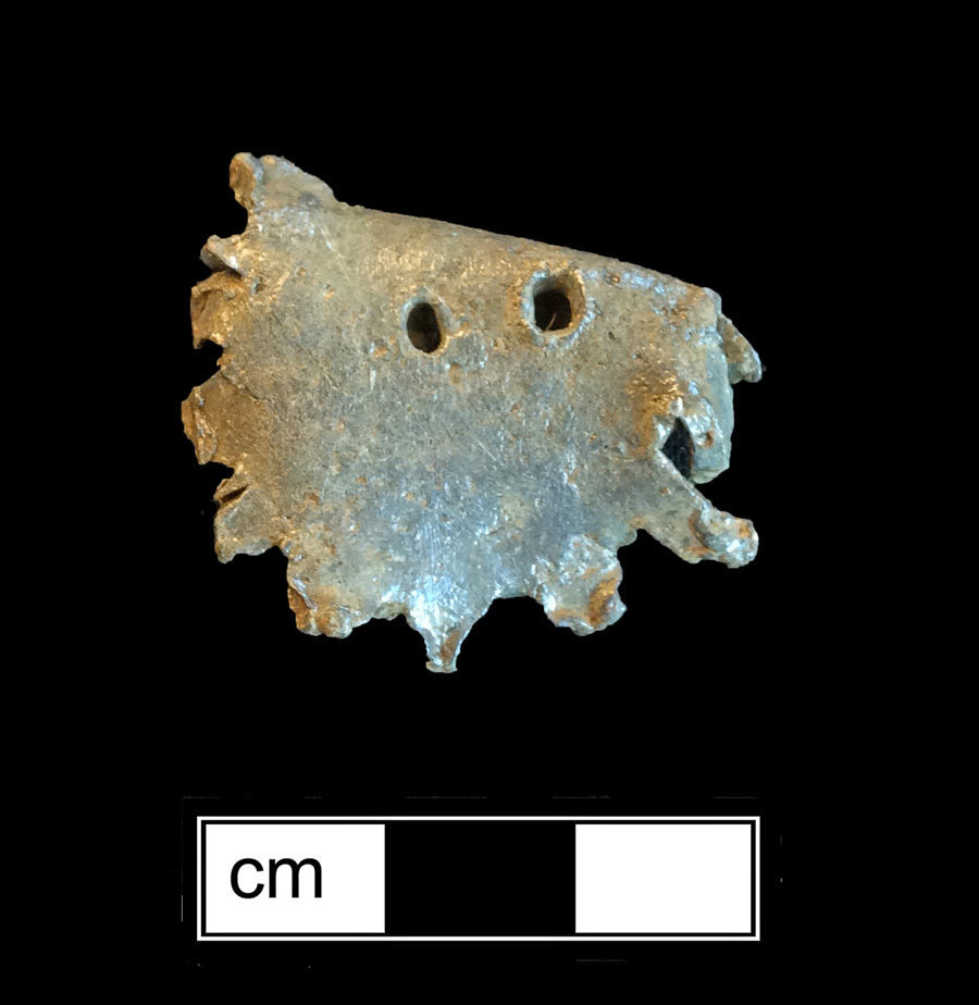 Image of lead game piece.