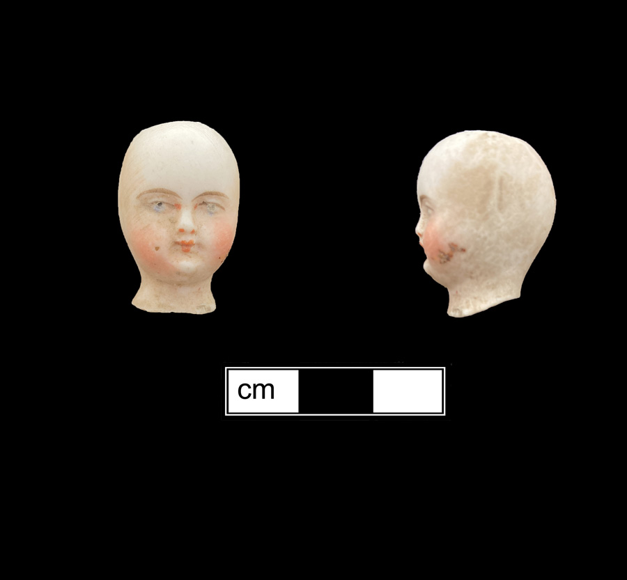 Image of porcelain bisque painted toy doll.