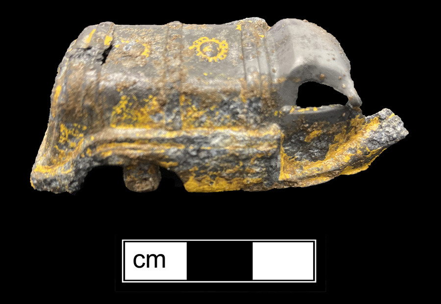 Image of white metal toy vehicle.