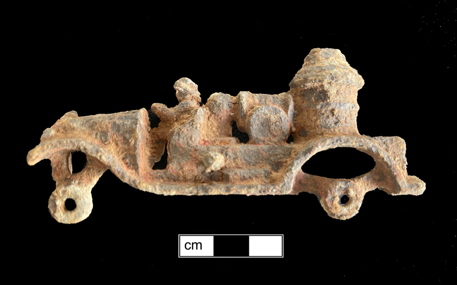 Image of iron toy vehicle.