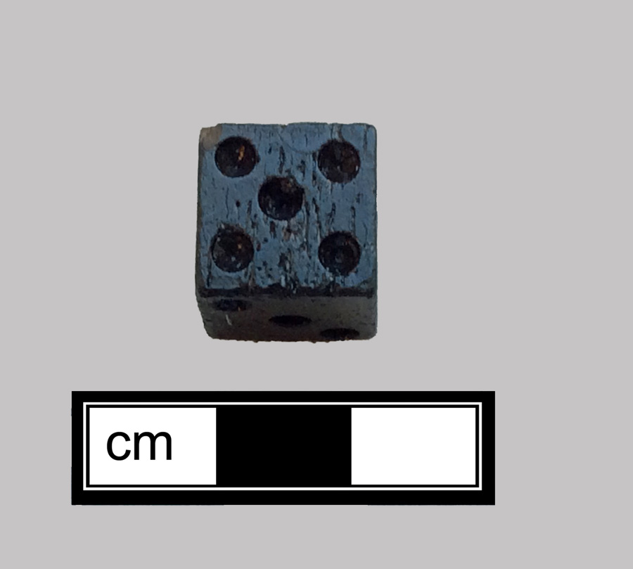 Image of bone game piece.