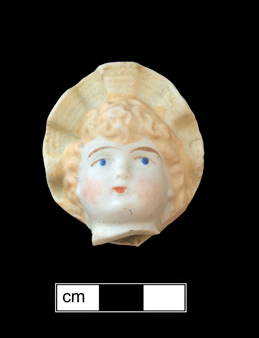 Image of porcelain bisque painted toy doll.