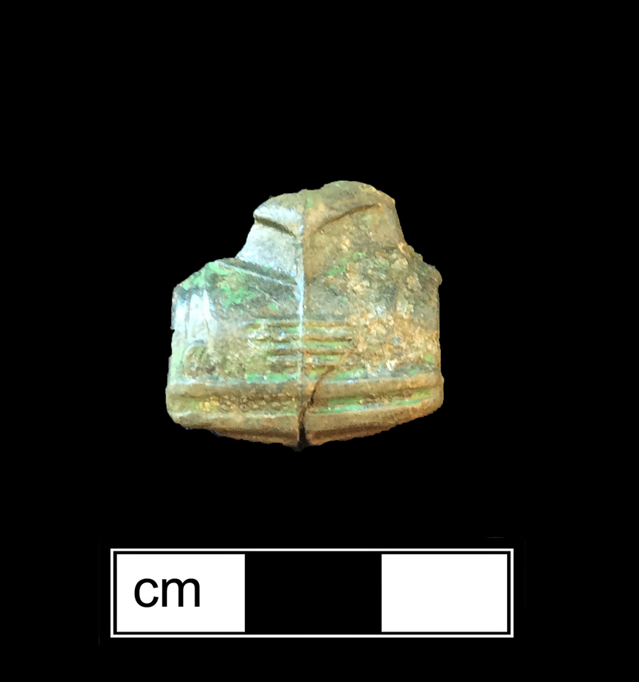 Image of white metal painted toy vehicle.
