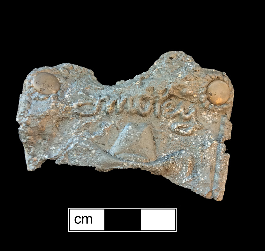Image of white metal toy.