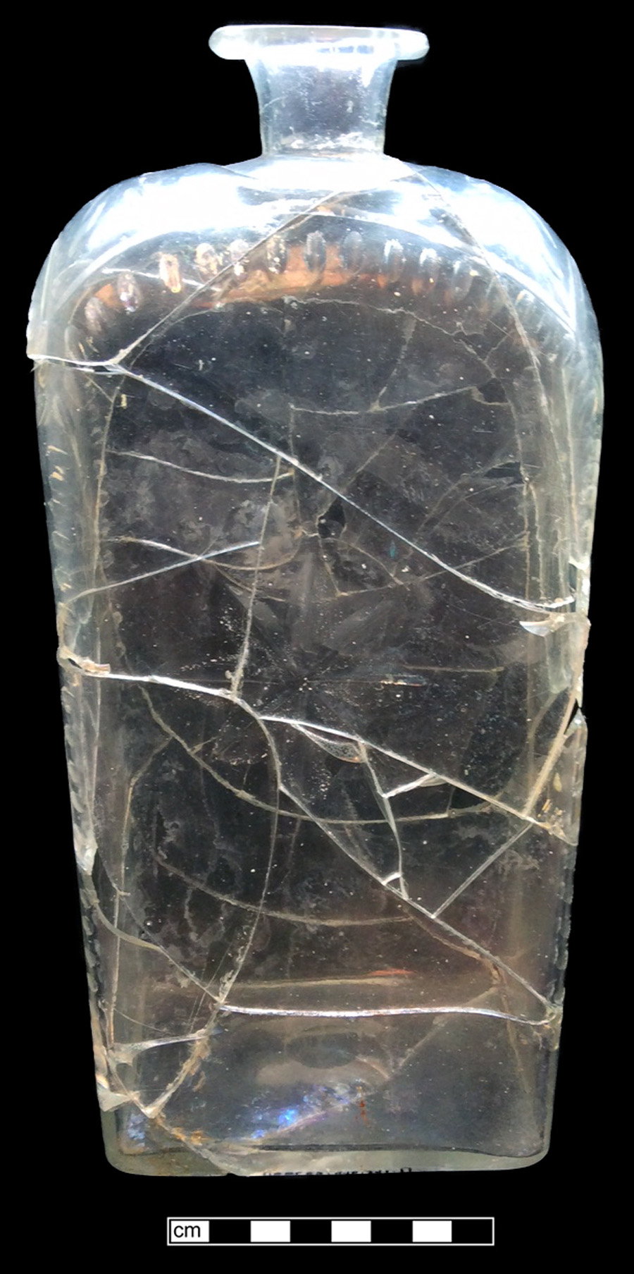 Image of colorless glass case bottle, abrasive decoration.