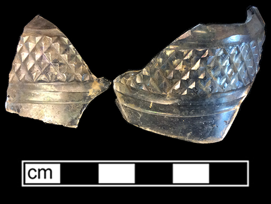 Image of colorless glass cruet or castor, abrasive decoration.