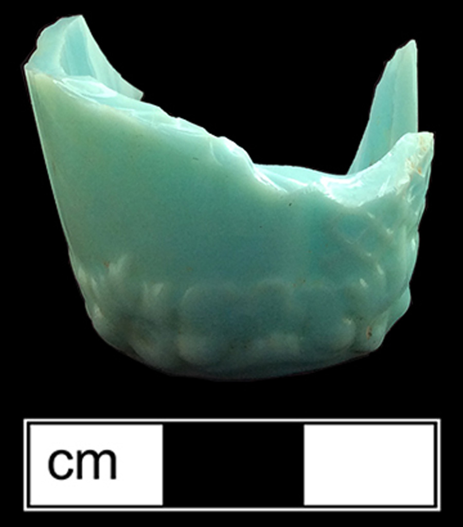 Image of opaque colored glass hollow vessel, hot glass decoration.